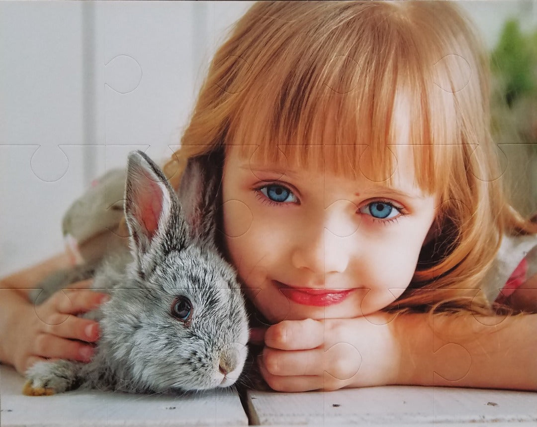 Pet Mother's Day gift showing her pet on a puzzle.  This puzzle is personalized with a photo of a girl and her pet rabbit.  The Mother's Day pet lover will assemble this puzzle.
