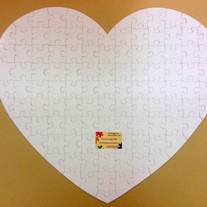 Giant Heart Shaped Guest Book Puzzle with White Puzzle Pieces The Missing Piece Puzzle Company