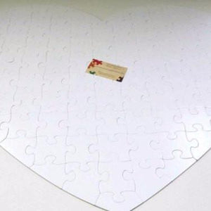 Giant-Heart-Shaped-Guest-Book-Puzzle-with-White-Puzzle-Pieces The-Missing-Piece-Puzzle-Company