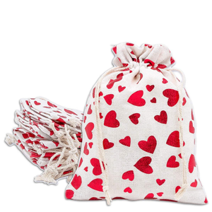 Add A Gift Bag. white gift bag with bright red hearts.
